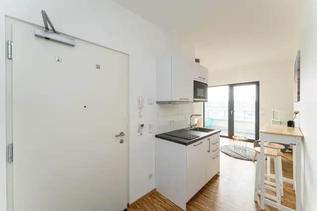 Bright and cosy rooftop studio with balcony in Pankow-Süd