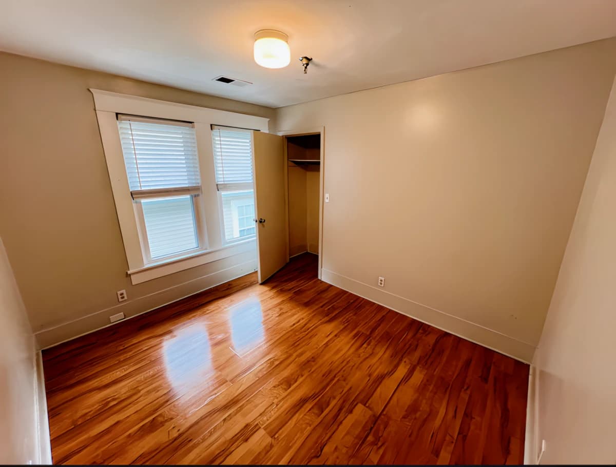 202 - medium bedroom w/ shared bathroom