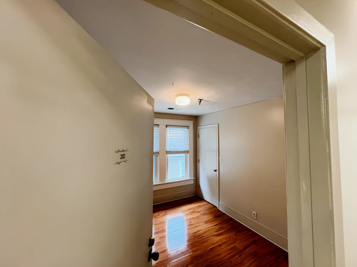 202 - medium bedroom w/ shared bathroom
